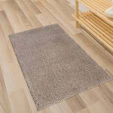 Black White And Brown Rug Andiamo Cala Millor Tufted Beige Rug With Images Beige Rug Blue Grey Rug Taupe Rug