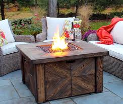 Fire pits are among the numerous items you can buy on the site. Costco Sale Global Outdoors Faux Wood Fire Table Frugal Hotspot