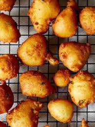 They are typically made with cornmeal, flour, egg, buttermilk, baking soda, and onion Hush Puppies Recipe How To Make Hush Puppies Spoon Fork Bacon