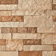 Smaller 4x4 stone tiles in a lighter shade incorporate texture into the area. All About Stone Veneer Stone Veneer Stacked Stone Panels Veneers