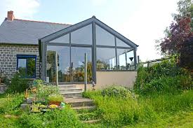 Veranda Salon Tres Vitree Avec Une Charpente Bois Et Toiture En Ardoise Www Verandaline Com Extension Maison Veranda Charpente Bois
