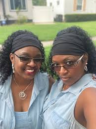 Identical twins attend twin festival