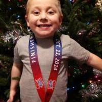 Marion boy with rare heart defect gets encouragement from 'running buddy'