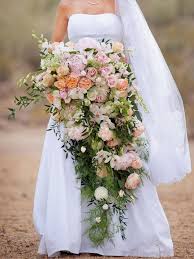 15 Cascading Wedding Bouquets For Every Style Cascading Wedding Bouquets Large Wedding Bouquet Cascading Bridal Bouquets