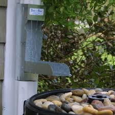 When it rains, and water is flowing off the roof, down the gutter, through the spout, and into the barrel.well, the whole system makes these amazing melodic dripping noises that you don't get from a plastic barrel. Greatamericanrainbarrel 0 Gallons Gal Metal Diverter Reviews Wayfair