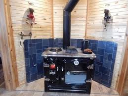 The temperature rise inside a sealed cabinet without forced ventilation can be approximated as follows. Wood Cook Stove Installation