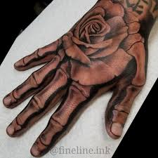 Skeleton Hand And Rose Tattoo By Rudy Fineline Ink Skeleton Hand Tattoo Hand Tattoos For Guys Rose Hand Tattoo