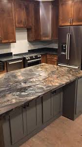 Stunning Blue Fusion Leather Quartzite For The Island And Steel Grey Leather For The Exterior Kitchen Island Design Kitchen Remodel Granite Countertops Kitchen