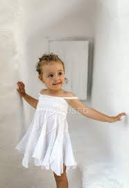 Toddler Girl Wearing White Summer Dress In White Interior Building Selective Focus Stock Photo 179031992