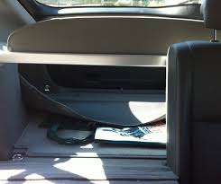 How to unlock a toyota with a dead battery push the key release on the back of the key fob, remove and remove the emergency key. How To Open Your Toyota Prius Trunk A K A Boot When Your Battery Is Dead Axleaddict