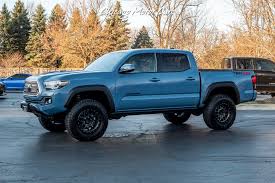 But unless toyota brings the tacoma into the 21st century technology, aka disc rear brakes and stops with the forced packages in order to get wanted accessories that they will likely lose my business. Used 2019 Toyota Tacoma Trd Off Road 4x4 Lifted With Upgraded Tires Rare Calvary Blue For Sale Special Pricing Chicago Motor Cars Stock 17641b
