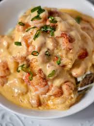 This quick and easy seafood casserole gets bright flavor from fresh dill and feta cheese. Seafood Stuffed Potatoes Recipe Seafood Recipes Healthy Seafood Recipes Seafood Dinner