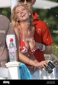 Oops, she did it again! Actress Tara Reid just can't make her boobs behave.  The cosmetically-enhanced blonde almost let it all Stock Photo - Alamy