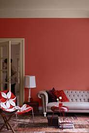 It is a nice contrast to use against light wood, antlers and other rustic decor. Create A Burnt Orange Living Room Ideas Dulux