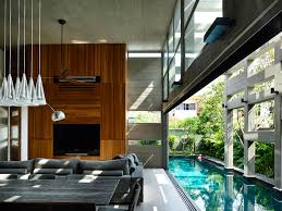 Check spelling or type a new query. Indoor Outdoor Courtyard Swimming Pool Runs Deep Into A Modern House Idesignarch Interior Design Architecture Interior Decorating Emagazine