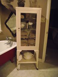 Doors with a mirror, layered and chipped paint or added. Old Medicine Cabinet Repurposed For My Bathroom Old Medicine Cabinets Cabinet Home Decor