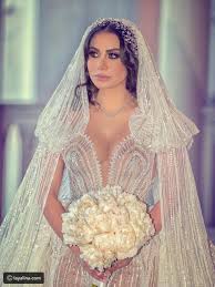 أصبحت صور فستان زفاف غنوة زين الدين ملكة جمال العرب في أمريكا لعام 2014 الأكثر تداولا عبر مواقع التواصل بسبب روعة تصم Dresses Bridal Accesories Bridal Dresses