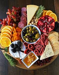 Then, add the crackers around the cheese and meats. Charcuterie Board Meat And Cheese Platter Modern Honey