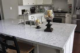 Lyra silestone quartz kitchen tops with white cabinets featured also a white porcelain farm sink, kitchen island, and stainless steel appliances. 36 Silestone Lyra Ideas Silestone Lyra Silestone Countertops