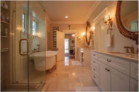 A spacious primary bathroom featuring decorated walls and tiles floors topped by an area rug. Beige And White Bathroom Ideas Grey And Marble Bathrooms