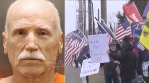 Idaho man accused of ramming car into Tesla counterprotester