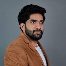 Vinod Kartha (He/Him)