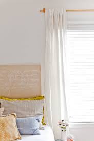 This will help you figure out how long your curtain rod needs to be. How To Make Diy Curtain Rods For Less Than 10 Paper And Stitch