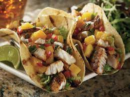 Crispy fried baja fish tacos with crunchy cabbage, fresh pico de gallo, and creamy white sauce all finished with tangy lime! Bonefish Grill Grilled Fish Recipes Delicious Seafood Recipes Grilled Fish Tacos