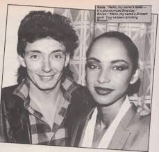 Bruce Foxton of The Jam pictured here with Sade Adu.