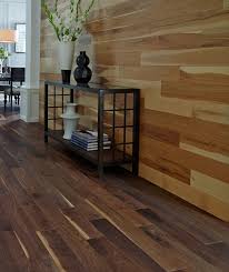 Laminate, hardwood and vinyl plank flooring is installed similarly to shiplap and can be a creative, more affordable alternative. Top Floors Wood On Walls Ll Flooring Blog Flooring On Walls Flooring Trends Wood Floor On Wall