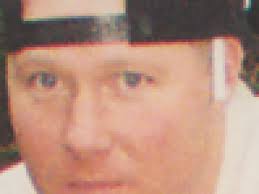 Woodland murder suspect arraigned