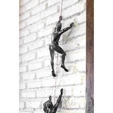 Climbing man resin iron wire wall hanging decoration nordic creative art background wall sculpture retro present statue decor. Climbing Man Wall Sculpture You Ll Love In 2021 Visualhunt