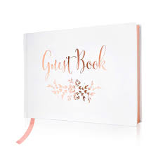 A transparent layer of pink lays over the photo, adding some color to the design. J A Homes Wedding Guest Book Polaroid Album Photo Guestbook Registry Sign In With Gold Foil Gilded Edges White Hardbound Book With Bookmark 9 X 6 Small Rose Gold 100