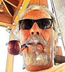 Relaxing with pipe and bourbon