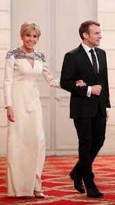 While brigitte macron, 64, and emmanuel macron, 39, have a large age difference, their love story has the makings of an unconventional yet perfect the unconventional love story of emmanuel and brigitte macron. Brigitte Macron Chooses Custom Louis Vuitton For The Luxembourg State Dinner Fashion Dresss French First Lady Fashion