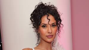 Maya Jama is a goddess at Cannes in deep-V corset lace gown