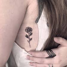 Rose tattoos are very lovely to look at. 23 Chic Small Rose Tattoos For Women Stayglam