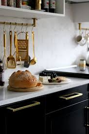 The Reveal Of Our Black White And Gold Kitchen Swoon Worthy Gold Kitchen Black Kitchens Black Kitchen Cabinets