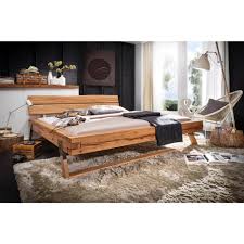 Queen size platform bed frame with 4 storage drawers and wood slat support. Trendstore Gerold Bett Wohnparc De