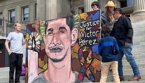 Small group rallies at Idaho State Capitol for Victor Perez