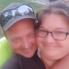 Where to find topsoil and rent equipment for yard leveling in Muscatine?