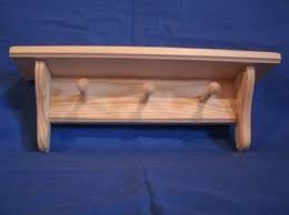 Mount these peg racks at child height to encourage children to hang up their coats and jackets. Rustic Wooden Sheves Wooden Shelves Wooden Wall Shelves Etsy Wooden Wall Decor Rustic Wooden Shelves Wooden Wall Shelves
