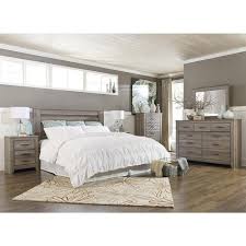 The only problem with the adjustable bases is that we couldn't use the traditional bedskirt that came with the bedding we purchased. Zelen 5 Piece King Bedroom Set In Warm Gray Nebraska Furniture Mart King Size Bedroom Sets Bedroom Furniture Layout Bedroom Sets