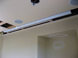 Home Theater The Big Picture Without The Big Price Stark Insider Home Theater Rooms Projector Screen Home Theater Design