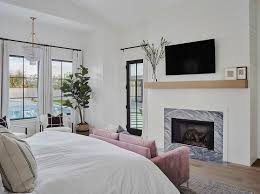 Amazing fireplace features marble herringbone tile surround and marble herringbone hearth. Shiplap Fireplace Wall Design Ideas