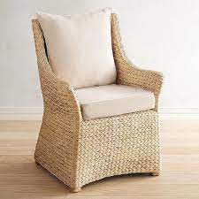 Made of hand woven rattan, a. Alexa Hand Woven Rattan Sloped Dining Chair