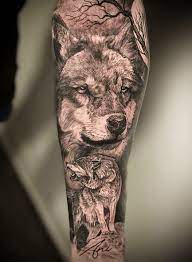 The design below expresses that calm nature which is so cute. 200 Wolf Tattoo Ideas With Meanings And History Tattoo Stylist