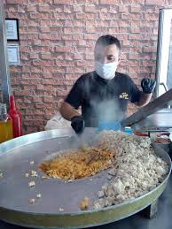 Delicious food made in the city of mersin in turkiye made by sliced meat (fried on the special pan), parsley, tomato, onion. By Pasa Tantuni Home Facebook