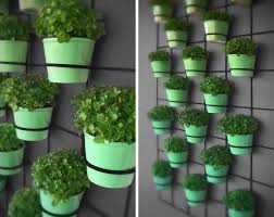 10 Diy Wall Art Projects For The Outdoors Small Vertical Gardens Vertical Garden Diy Outdoor Wall Decor