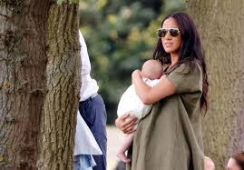 Meghan markle and prince harry have a zoom call crasher at home: The Real Reason Meghan Markle Was Holding Archie Awkwardly At Prince Harry S Polo Match